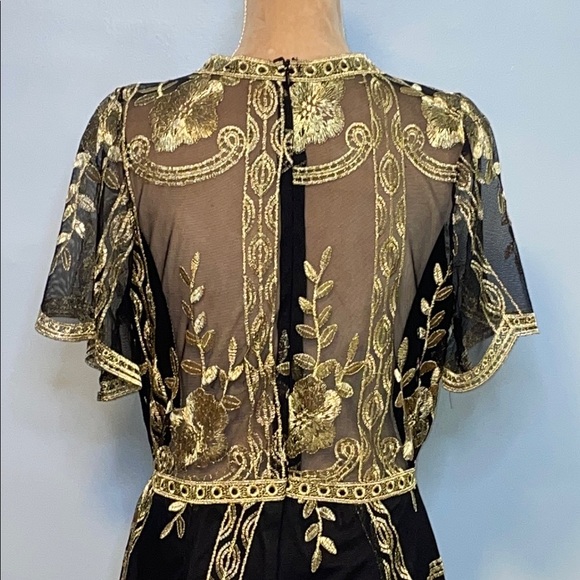 Elegant Black and Gold Romper with Modern Flair Size Medium - Picture 8 of 12